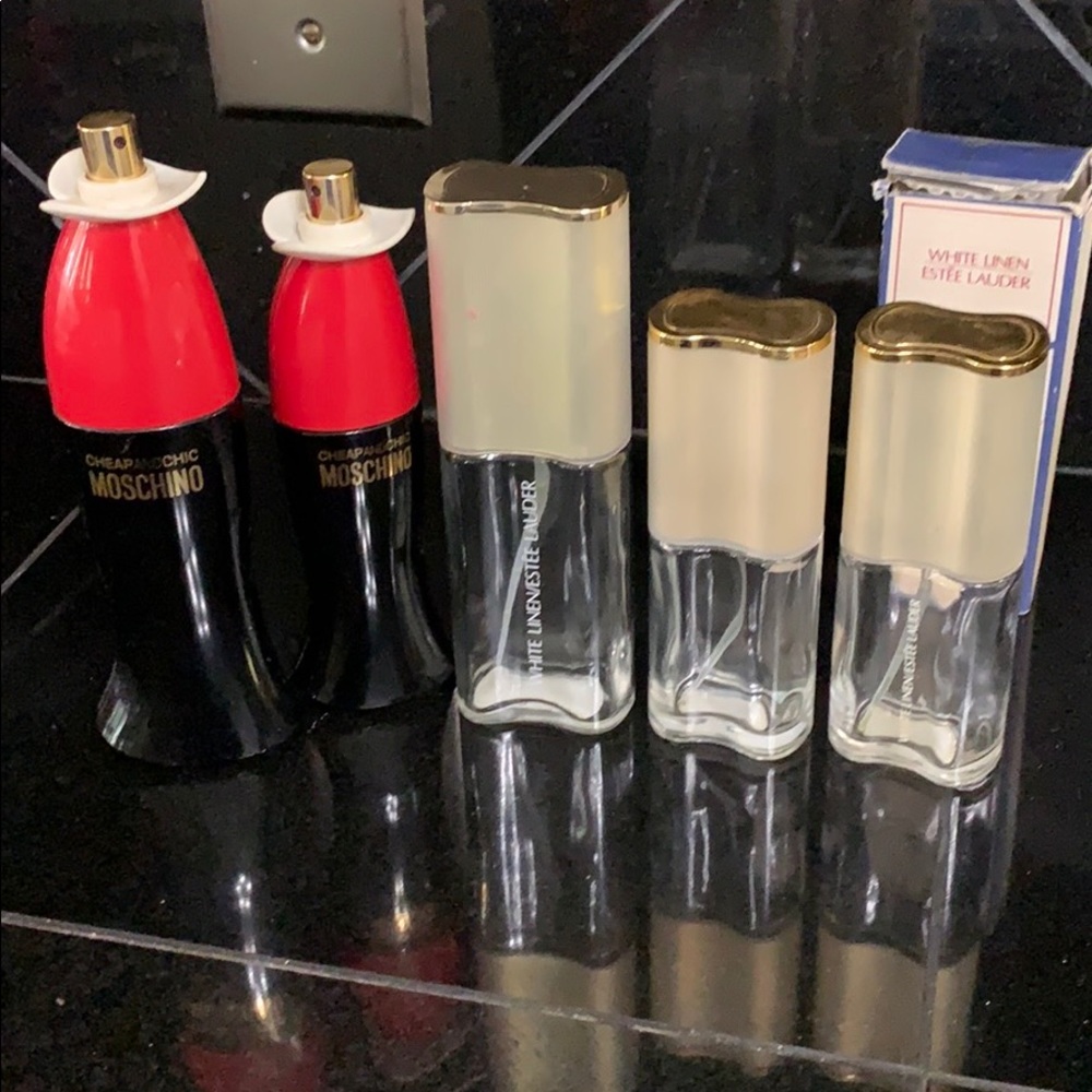 5 empty perfume bottles from ester lauded mochino